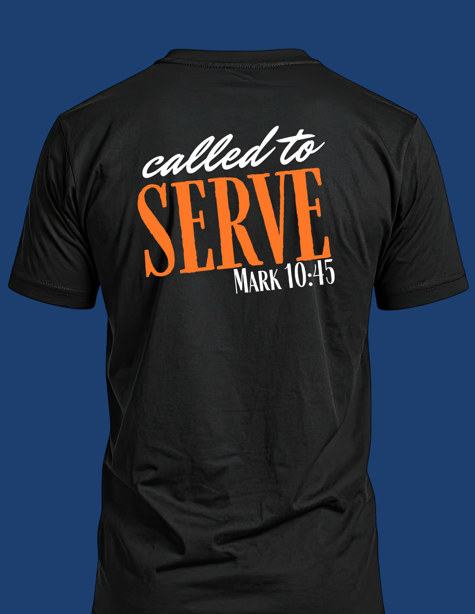 A black short-sleeve t-shirt shown from the back, featuring a graphic print that reads 'called to SERVE MARK 10:45' in white and orange lettering, set against a solid dark blue background.